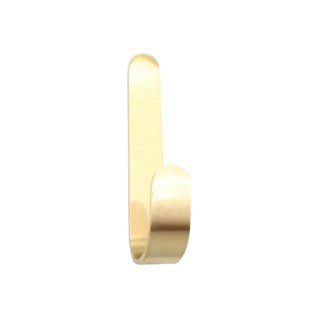 natural-goods-berlin-gard-wandhaken-jot-selbstklebender-wandhaken-in-gold-optik- image 1